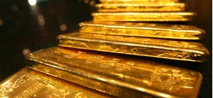Gold erases gains stemming from talk of Fed stimulus